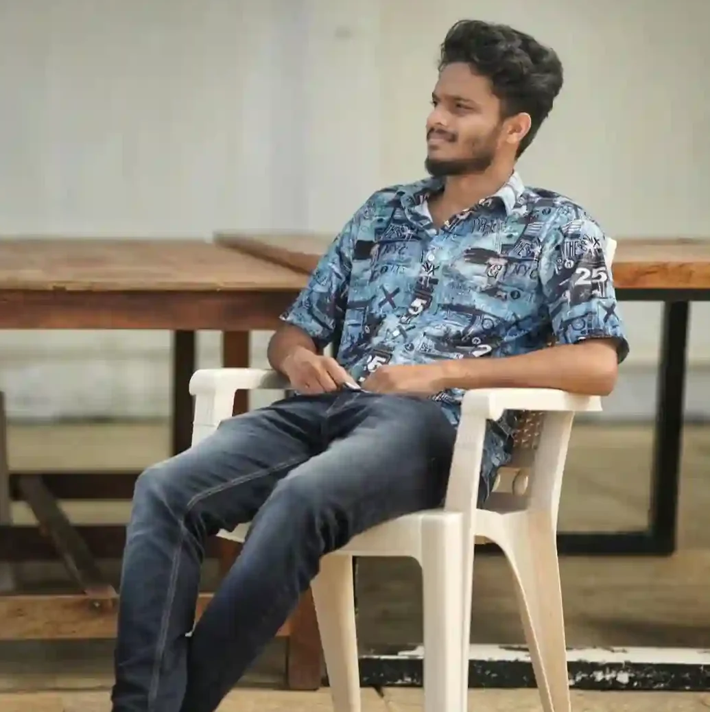 a man sitting in a chair certified digital marketing strategist in kannur